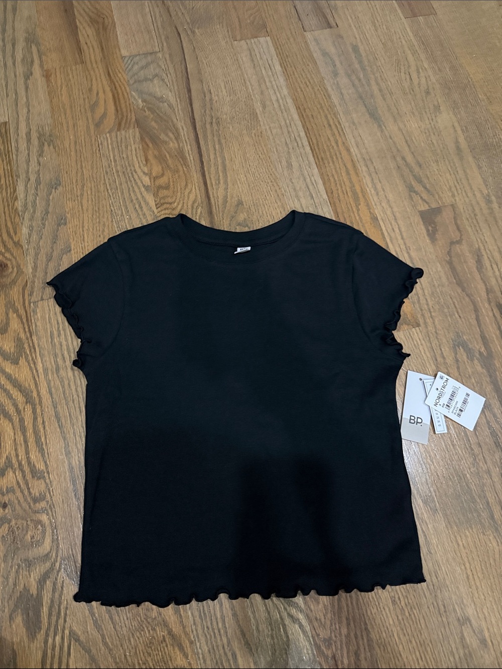 Brand new with tags*Wonens’ BP Black Ruffle Edge Short Sleeve Tee